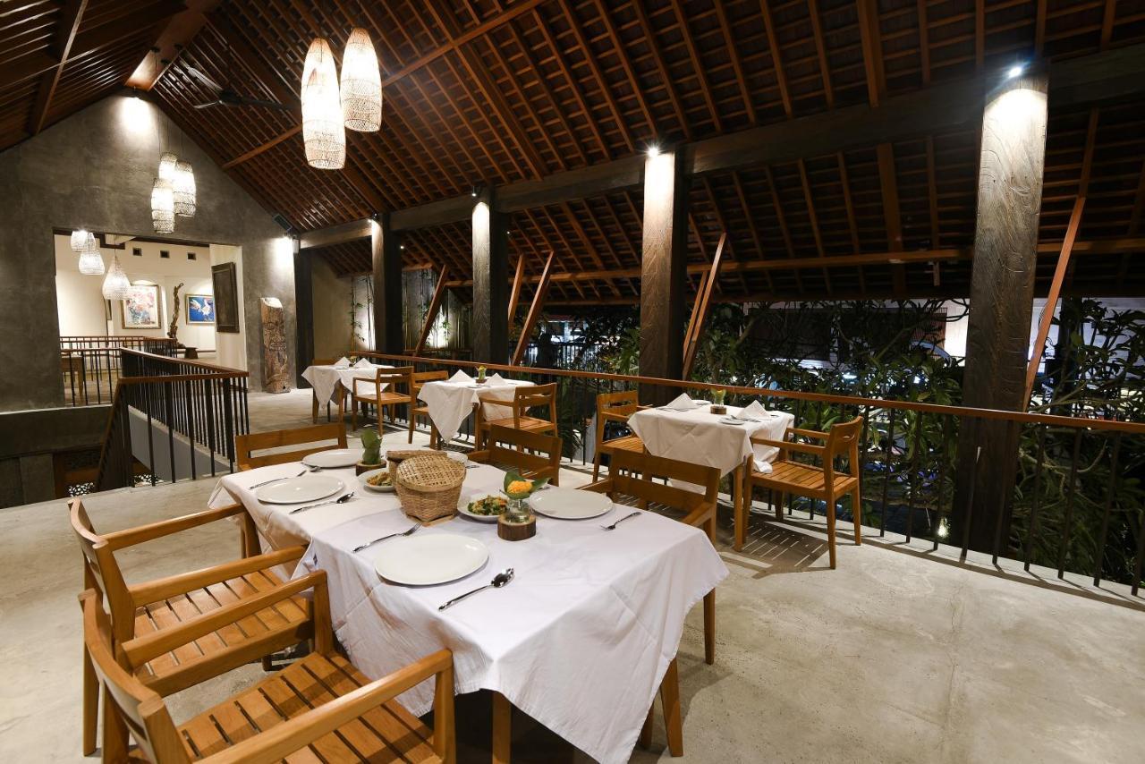 Purana Suite Ubud Ngoại thất bức ảnh The restaurant at the resort